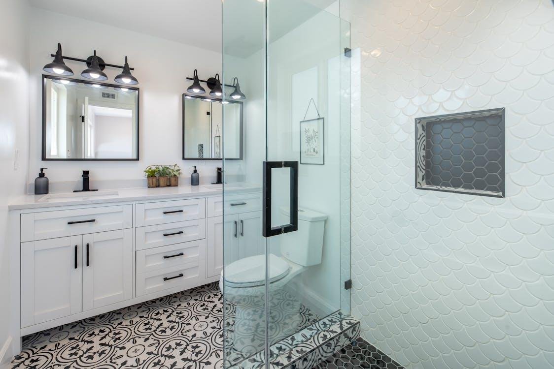 Recently remodeled bathroom in Lexington featuring stylish tile and updated vanity